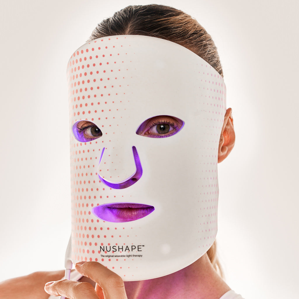 NuShape red light therapy face mask over face