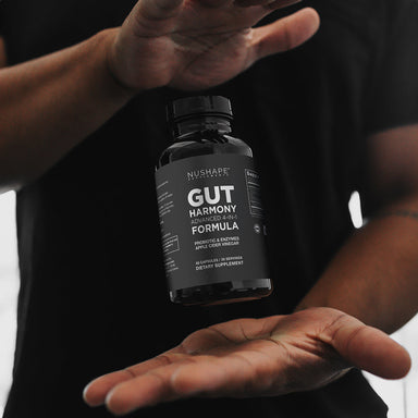 Gut Harmony holding bottle