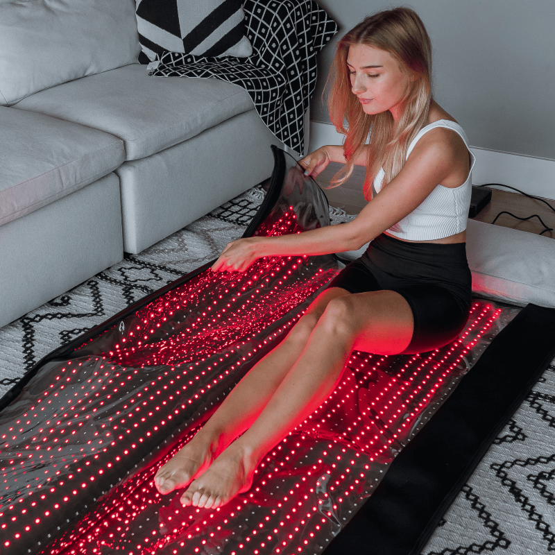 Healix athlete on red light therapy mat