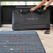 HEALIX mat and bag on a wooden floor with a window in the background