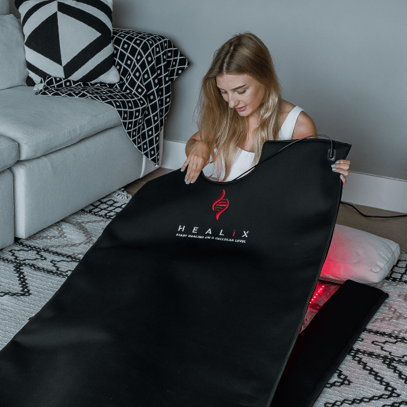women holding red light mat on carpet
