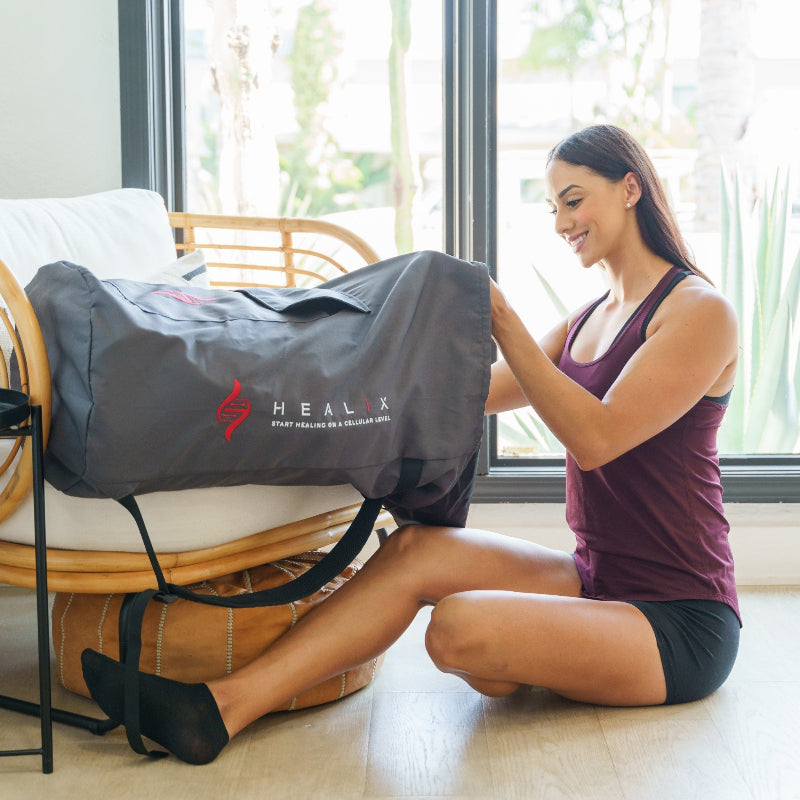 Woman using a HEAL-X product in a home setting