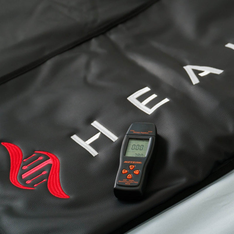 Sauna controller on a black bag with red logo and 'HEAVY' text.