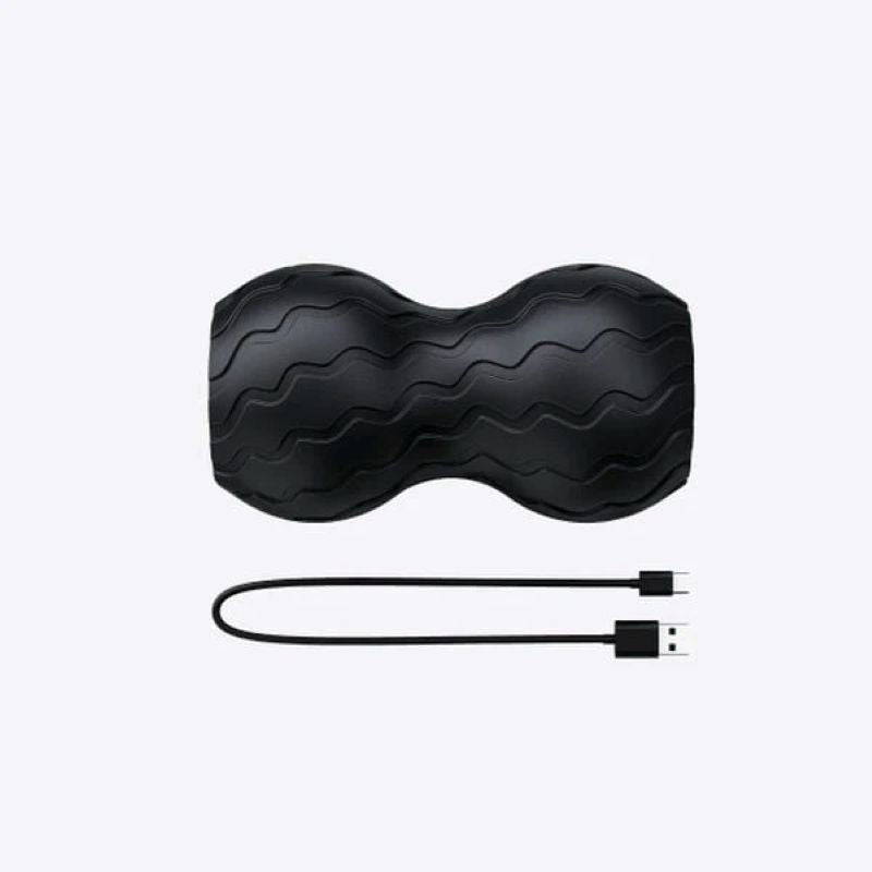 Black wavy massager with USB cable on a white background