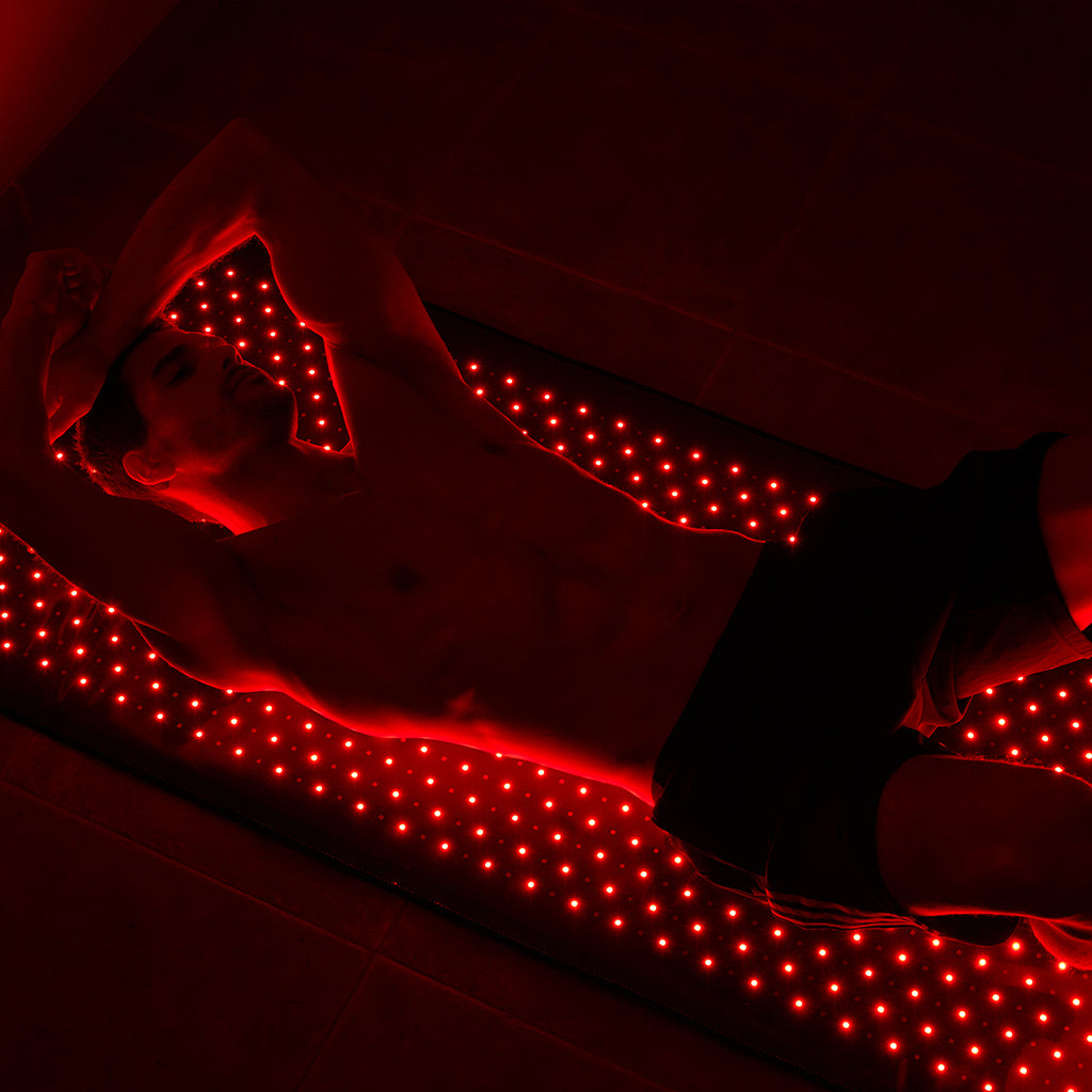 nushape red light therapy mat laying down