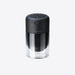 Black and clear container with Therabody branding on a white background
