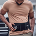 Man wearing a black waist trainer with a visible brand logo.