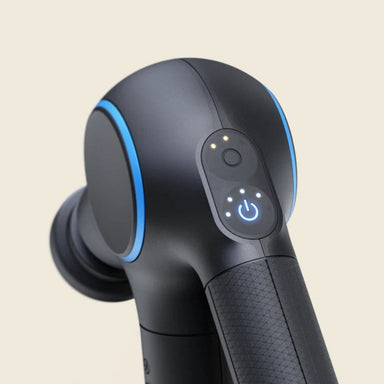 Black handheld device with blue accents on a beige background