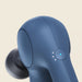 Blue wireless massager on a beige background